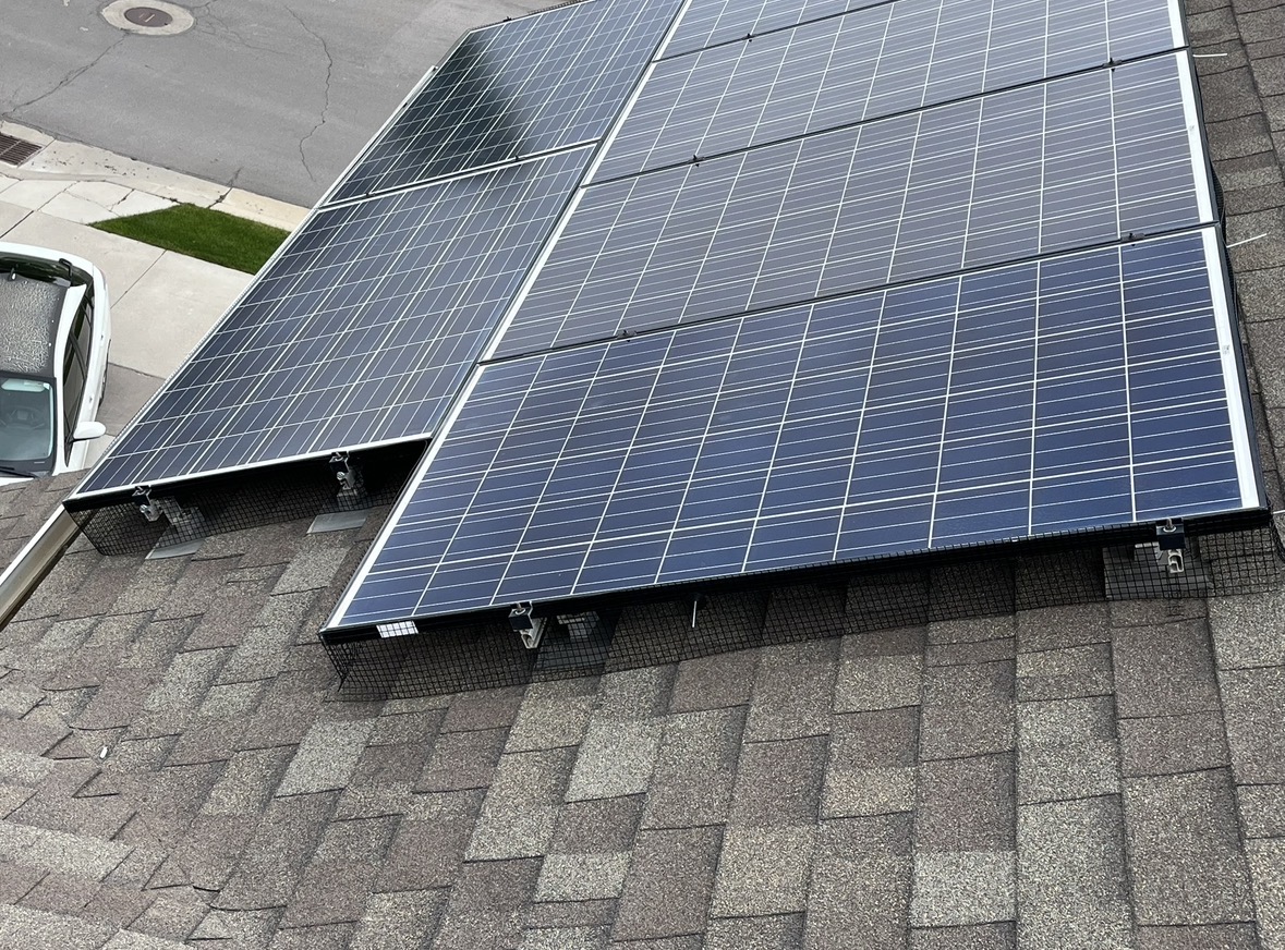 Solar panel critter guard installation completed