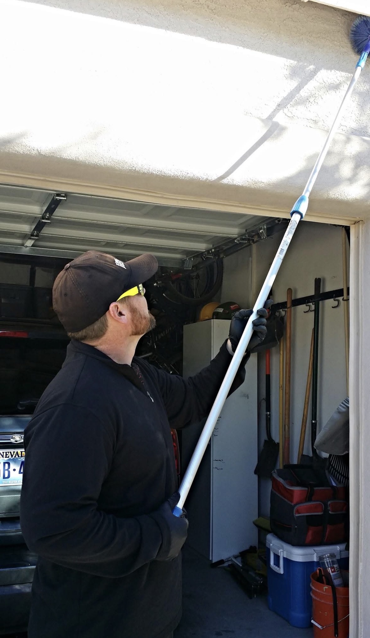 Spider and cobweb removal in garage
